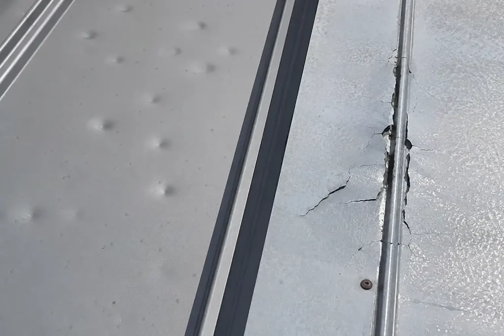 Cosmetic and functional hail damage on a metal roof