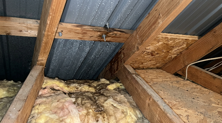 Metal roof condensation caused by poor attic ventilation